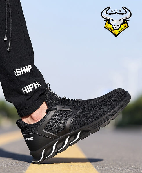 Model showing off KTG Safety Steel Toe Sports Safety Shoes Model SS55 - Knitted Mesh Black on his feet